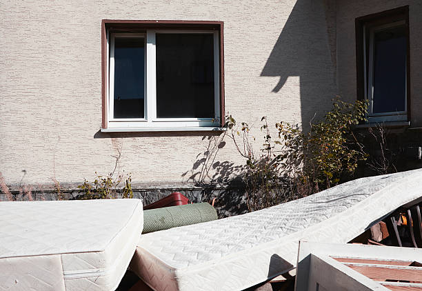 Part of a house with rubbish